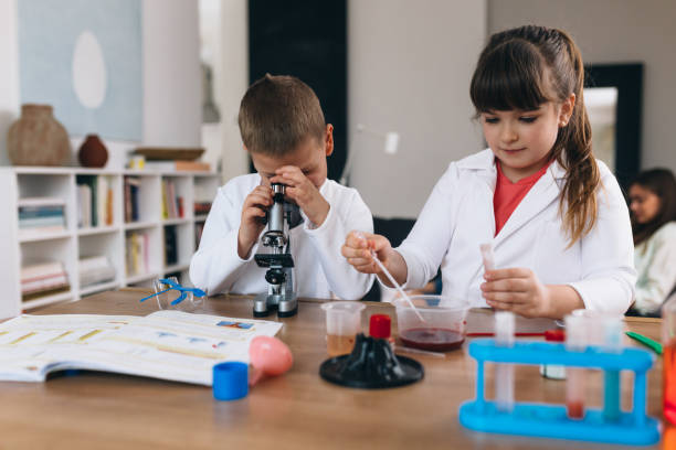 istock kids do chemical expriments at home 1306252975