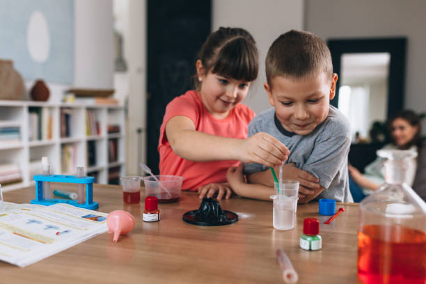 istock kids do chemical expriments at home 1306253616