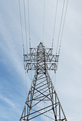 Low Angle View Of Electricity Pylon Against Clear Sky.Power line towers.