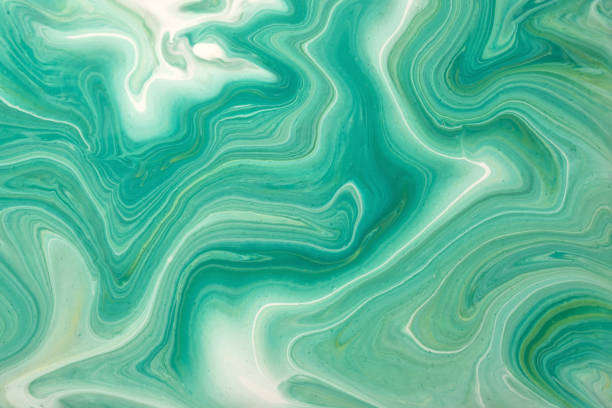 istock Abstract fluid art background light green and white colors. Liquid marble. 1306256566