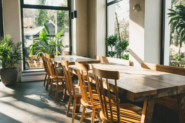 istock Empty wooden tables and chairs 1306261772