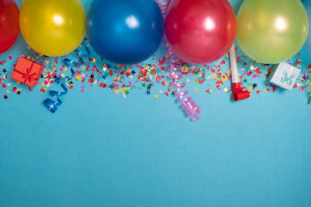 istock Flat party decoration concept on pastel blue background from above 1306263675