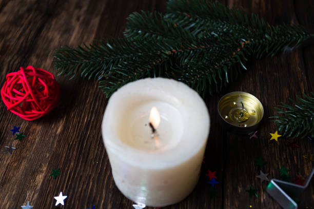 istock Christmas background stars burning candles 1306264407