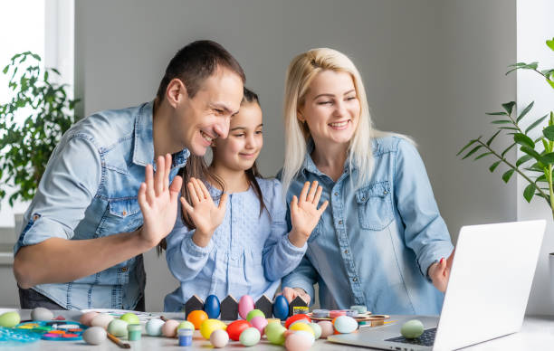 istock family for easter near laptop 1306281539