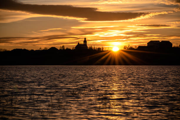 istock Beautiful spring sunset on the lake 1306284284