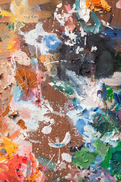 istock Background image of bright oil paint palette 1306285718