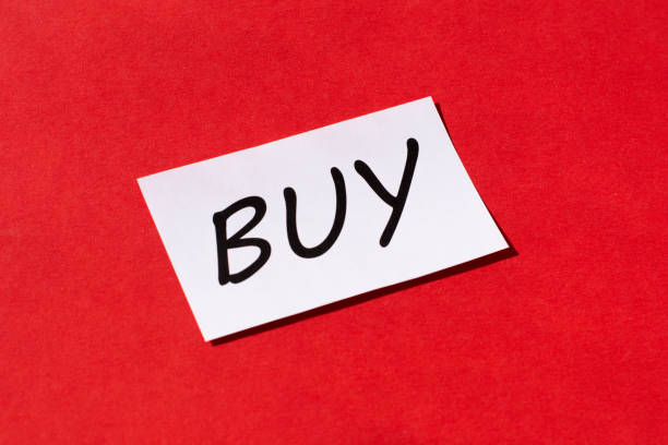 istock word buy on a red background. Shopping concept 1306288525