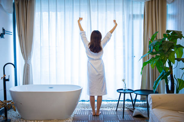 istock Young woman stretching hands in the morning 1306289536