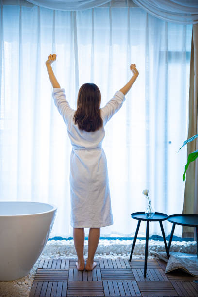 istock Young woman stretching hands in the morning 1306289848