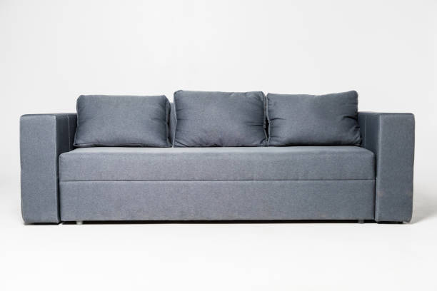 istock Studio shot of a grey modern sofa on white background 1306290074