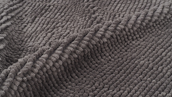 Rug or carpet texture and background with Wrinkled. It is grey color