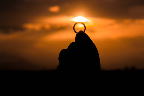 silhouette of a ring looks like wedding ring in sunset