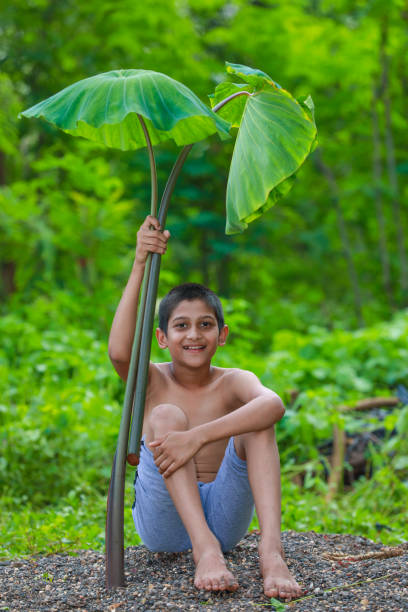 istock Cute indian little child enjoying with nature 1306303601