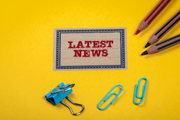 istock Latest News. Yellow notes and documents folder. Office supplies 1306307490
