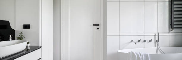 istock Luxury black and white bathroom, panorama 1306308810