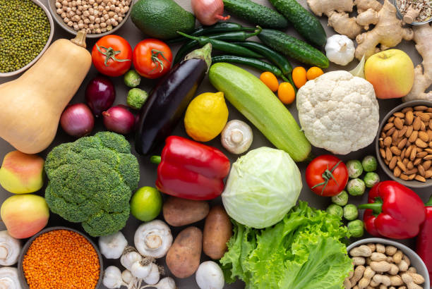 istock Background of vegetables, seeds, nuts and beans 1306310925