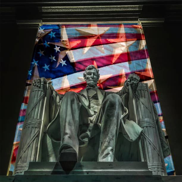 Stars, Stripes and Lincoln Statue of Lincoln in Lincoln Memorial with patriotic background of US flag and stars. emancipation proclamation stock pictures, royalty-free photos & images