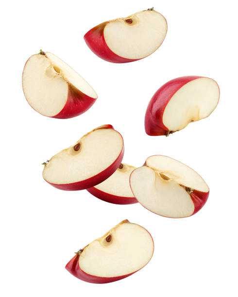 istock Falling Red apple slice isolated on white background, clipping path, full depth of field 1306313087