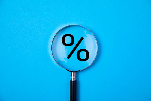 istock magnifying glass with percent 1306313175