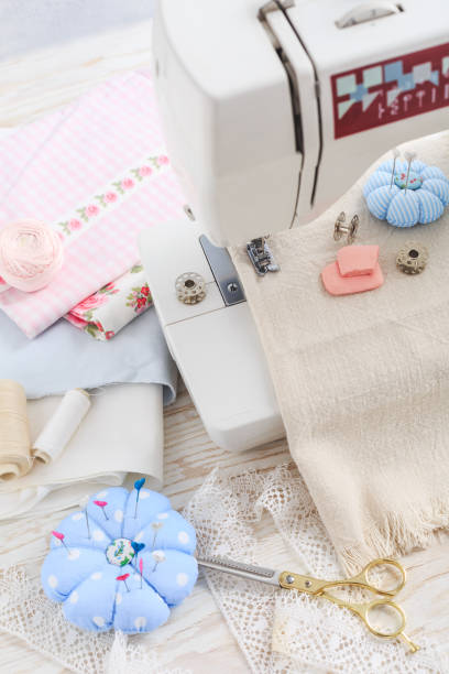 istock Sewing machine, tools and supplies. Hobby, crafting, creativity, free time at home concept 1306314258