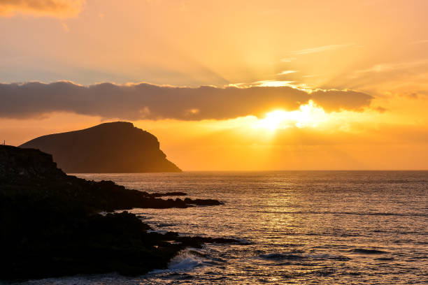 istock The Sun Setting in the Sea 1306319083