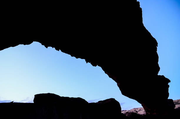 istock Natural Arch in the Desert 1306319088