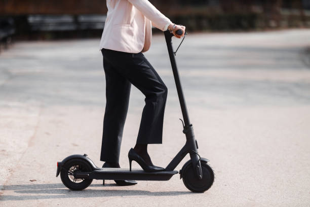 istock A young woman with electric scooter 1306324076