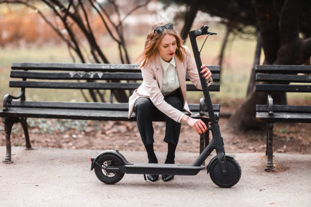 istock A young woman with electric scooter 1306324278