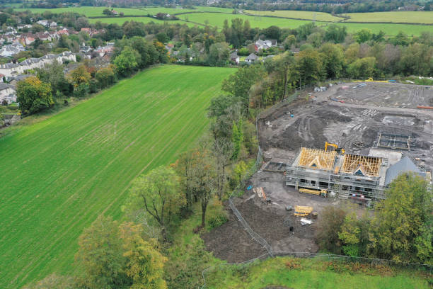 house development construction site in progress aerial view - building place imagens e fotografias de stock