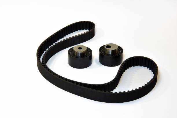 istock The timing belt and rollers stands on a white background 1306327798