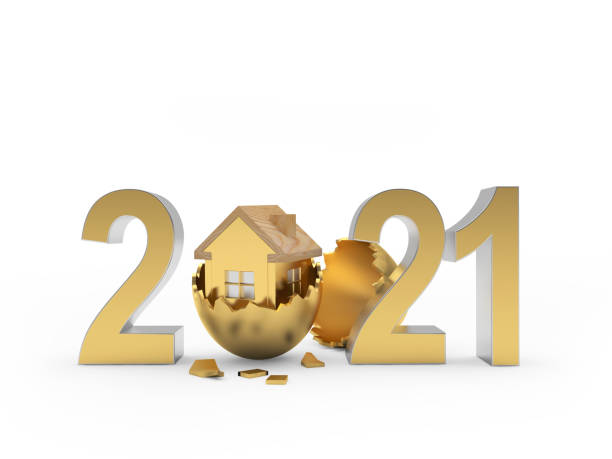 istock Gold number 2021 with house icon in a broken egg. 1306331842