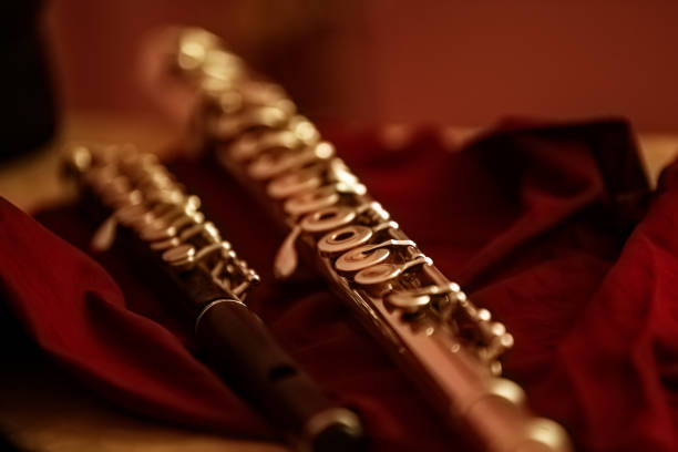 Fragment of a flute close-up in golden tones