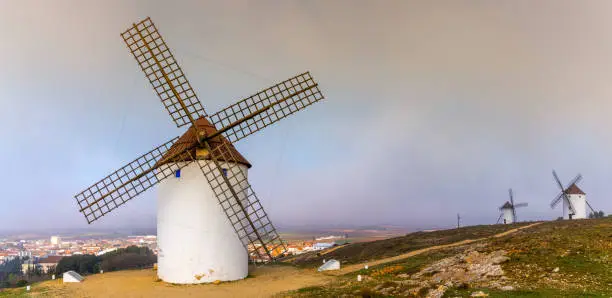 Photo of historic whitewashed windmills in La Mancha