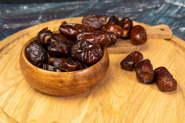 istock Dry date in a bowl. Ramadan Kareem with dates selective focus 1306338827