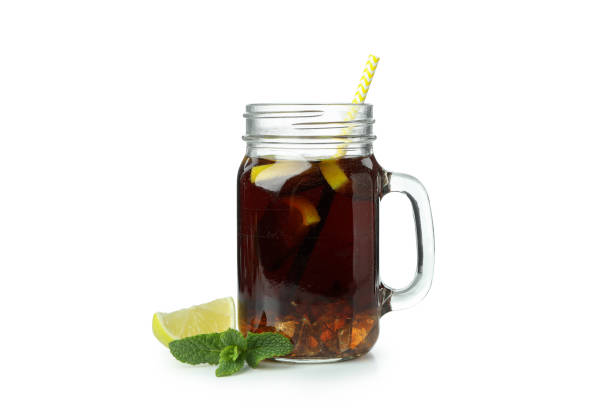 istock Glass jar of Cuba Libre isolated on white background 1306339548