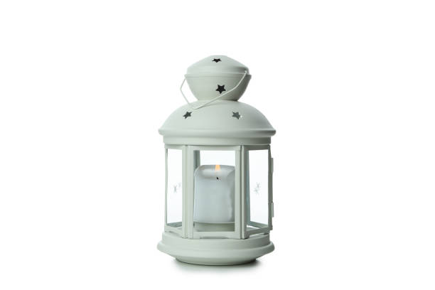 istock White lantern with candle isolated on white background 1306340436