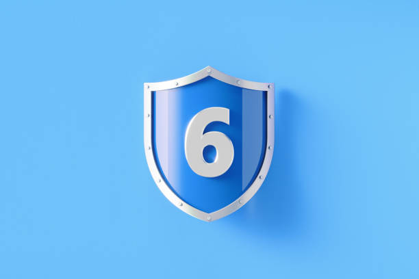 Silver shield with number 6 sitting on blue background, Horizontal composition with copy space. Security, safety and privacy concept.