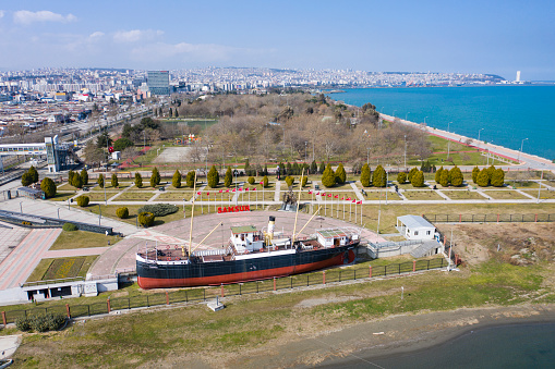 Canik, Samsun / Turkey - 04 March 2021: Monument of the first step of the national liberation struggle in Bandirma Ferry and National Struggle Park Open Air Museum in a clear day. Aerial view.