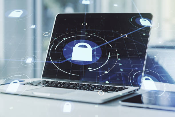 istock Creative idea concept with lock symbol and microcircuit illustration on modern laptop background. Protection and firewall concept. Multiexposure 1306341859