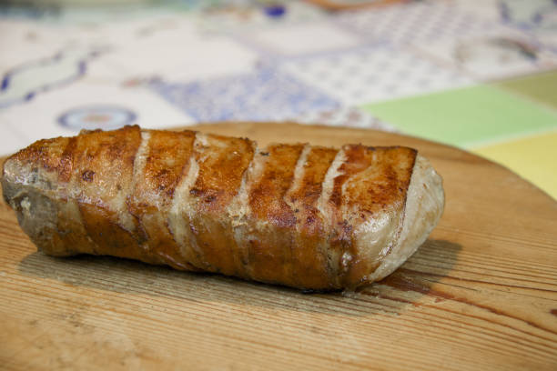 istock bacon roast pork on wooden cutting board 1306343397