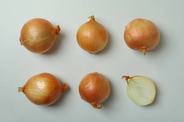 istock Flat lay with fresh ripe onion, top view 1306344950