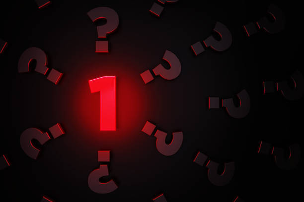 istock Q And A Concept - Red Number One Glowing Amid Black Question Mark Symbols On Black Background 1306346418
