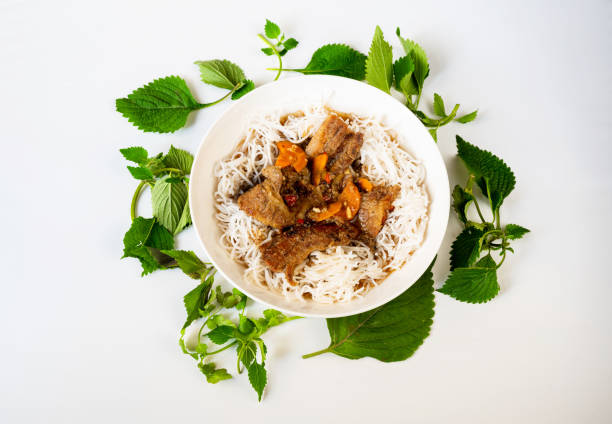 Vietnamese meal "bun cha" , circle from herb leaf. stock photo