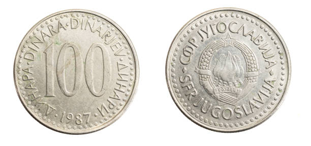istock Yugoslavian one hundred dinar coin on white isolated background 1306349124
