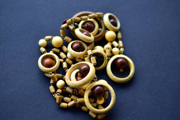 Handmade jewelry on wooden background