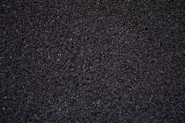 istock Black background made of foam rubber and polystyrene in holes 1306349302