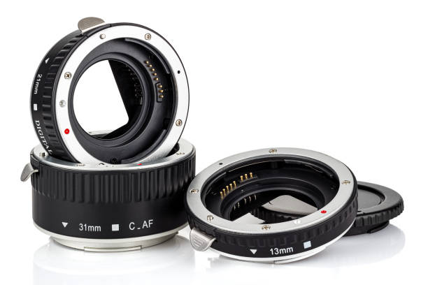 Extension rings for macro photography by DSLR camera isolated on white background