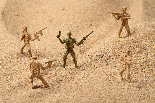 Plastic toy Soldiers in the Desert