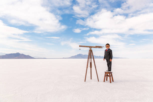 istock Young Business Boy Searches 1306350793