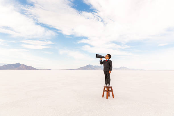 istock Young Business Boy with Megaphone 1306350827
